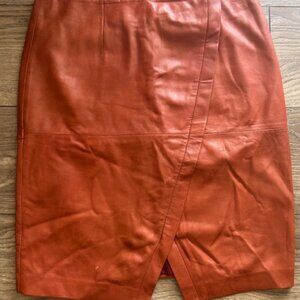 Chic 100% Leather Midi Skirt - Timeless Style in Size 10